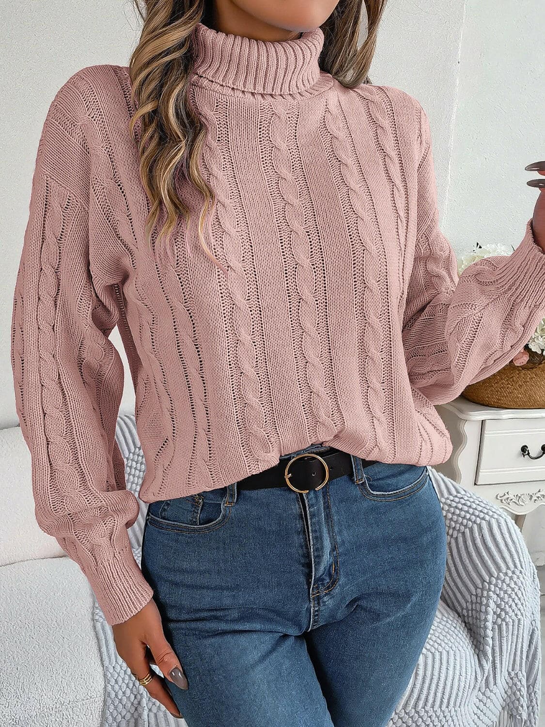 Cable-Knit Turtleneck Dropped Shoulder Sweater.