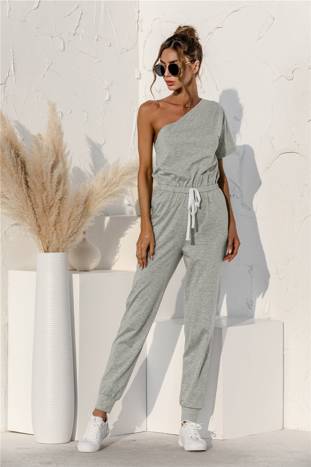 Single Shoulder Short Sleeve Jumpsuit.