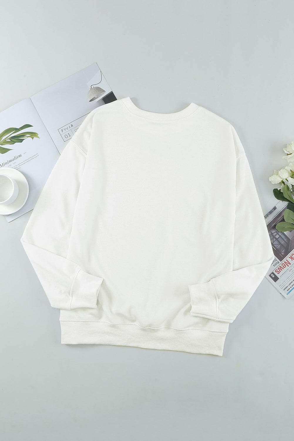 Round Neck Dropped Shoulder Sweatshirt.