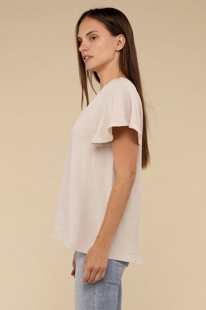 Woven Airflow Flutter Sleeve Top.