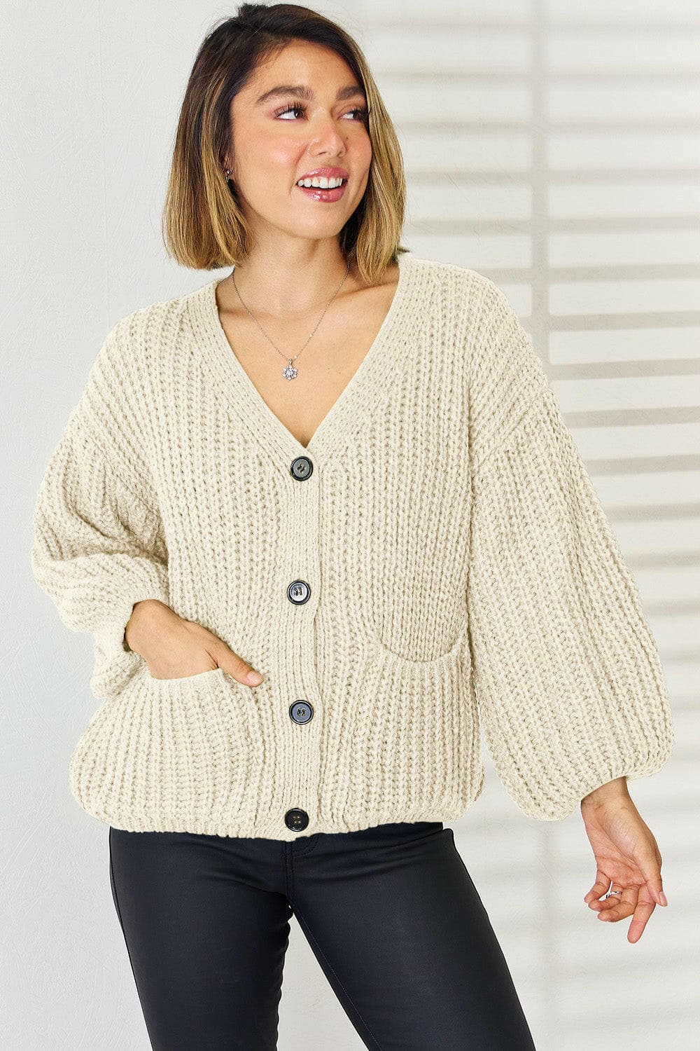 Pocketed Button Up Dropped Shoulder Cardigan.