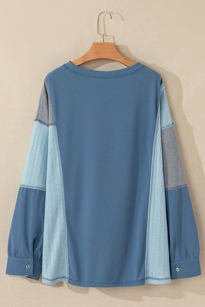 Dusk blue patchwork button-up long sleeve top with colorblock design