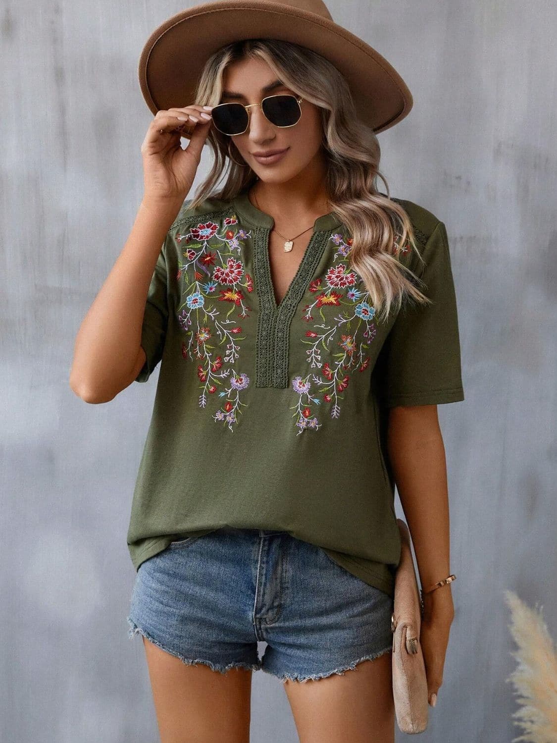 Embroidered Notched Short Sleeve T-Shirt.