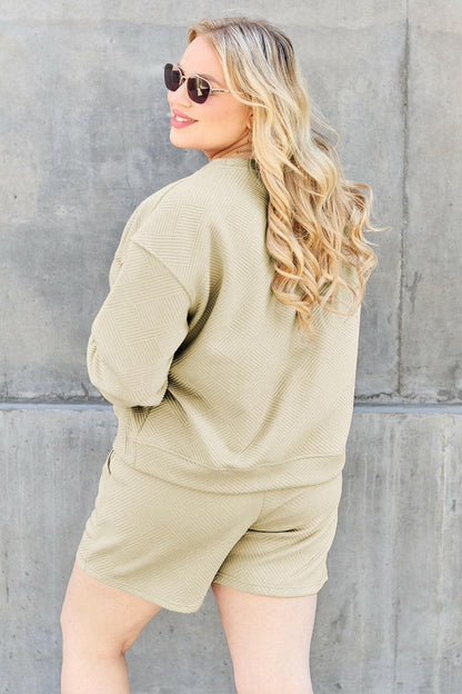 Double Take Full Size Texture Long Sleeve Top and Drawstring Shorts SeElevate Your Loungewear with Our Double Take Set
 Step into comfort and style with the Double Take Full Size Texture Long Sleeve Top and Drawstring Shorts Set. This Love Salve Full Size Texture Long Sleeve Topusa