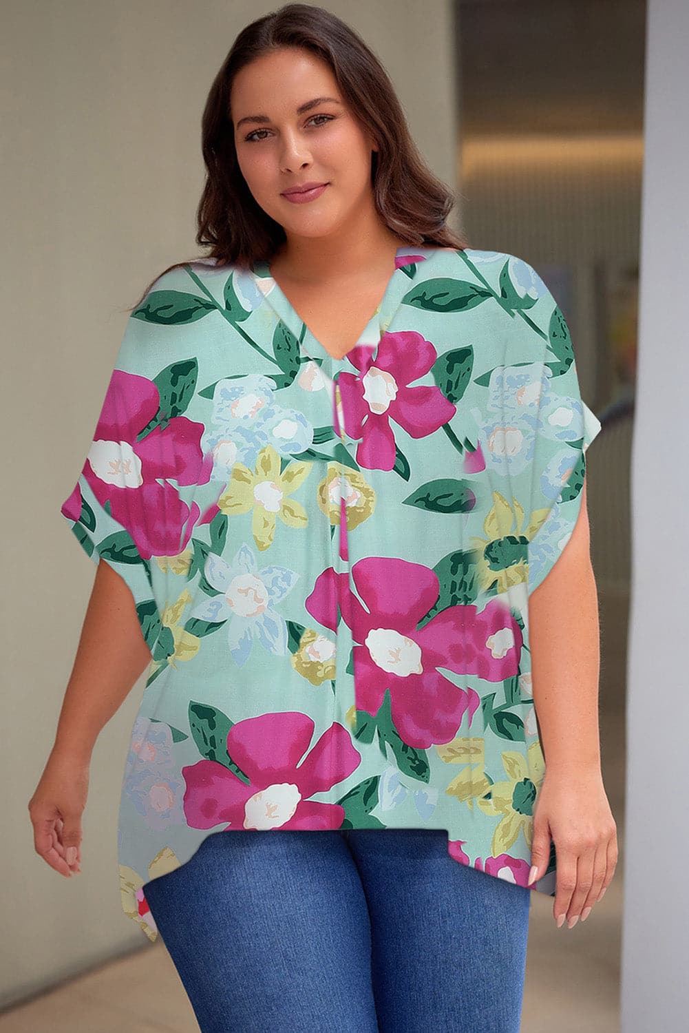 Plus Size Printed Notched Neck Half Sleeve Top.