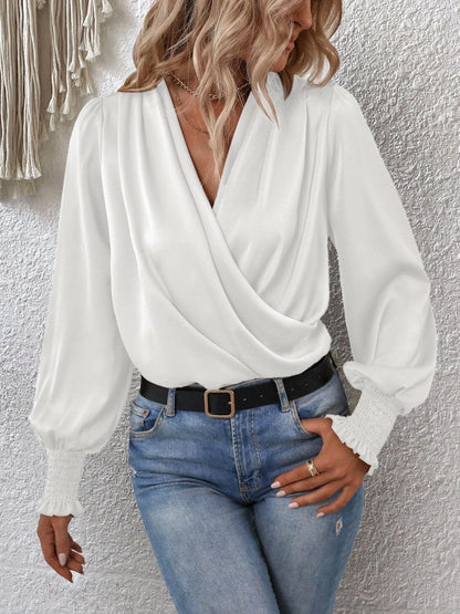 Surplice Smocked Lantern Sleeve Blouse.