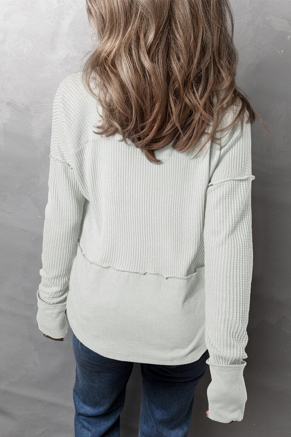 Waffle-Knit Exposed Seam Notched Long Sleeve Top.