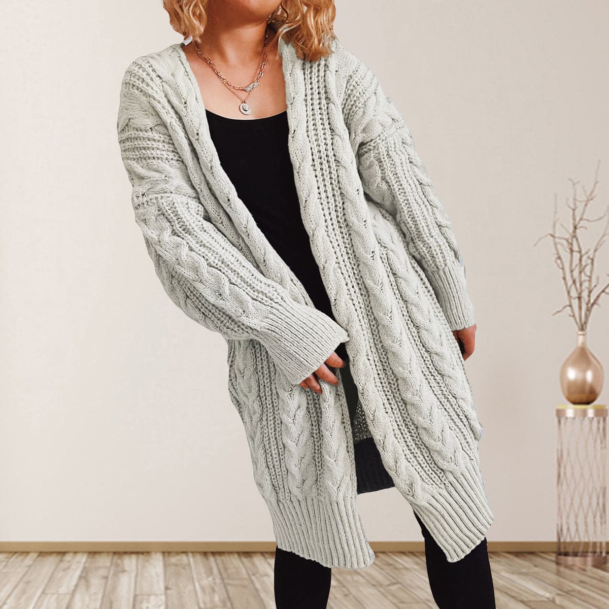 Cable-Knit Open Front Dropped Shoulder Cardigan.