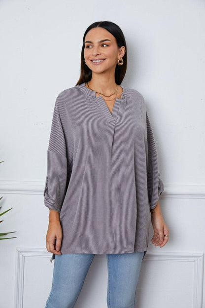 Notched Roll-Tab Sleeve Blouse.