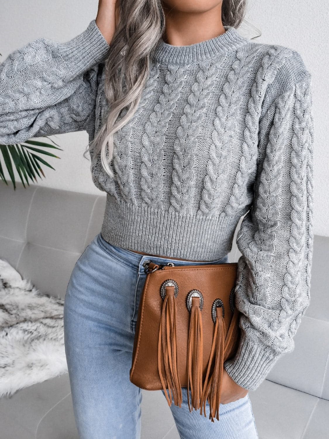 Cable-Knit Round Neck Sweater.