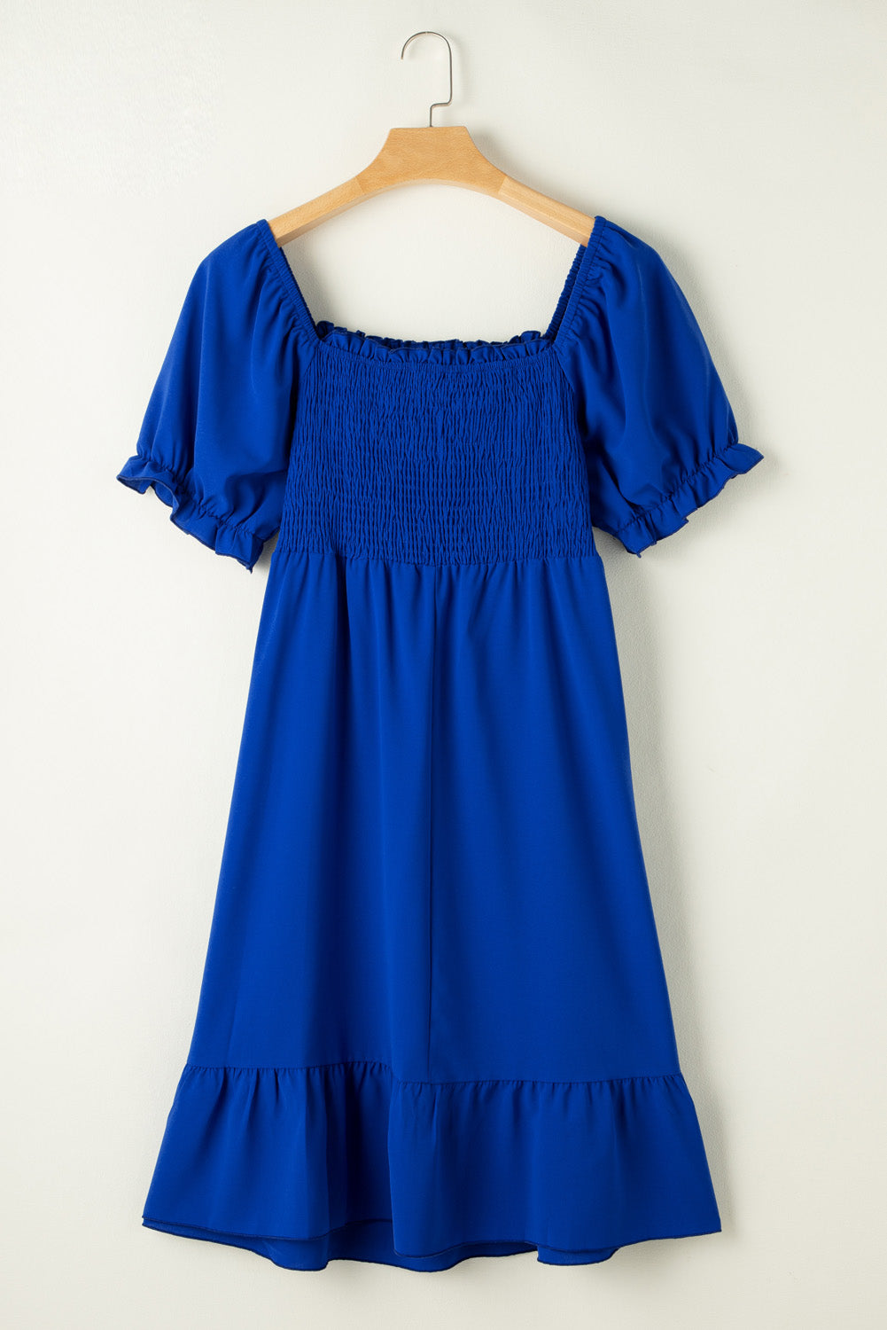 Flattering dark blue ruffled mini dress with square neckline for plus sizes