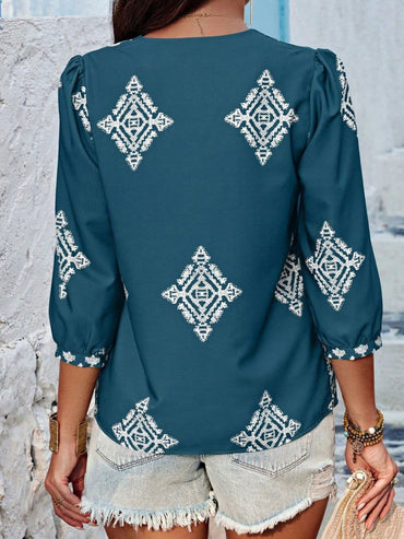 Printed V-Neck Three-Quarter Sleeve Blouse.