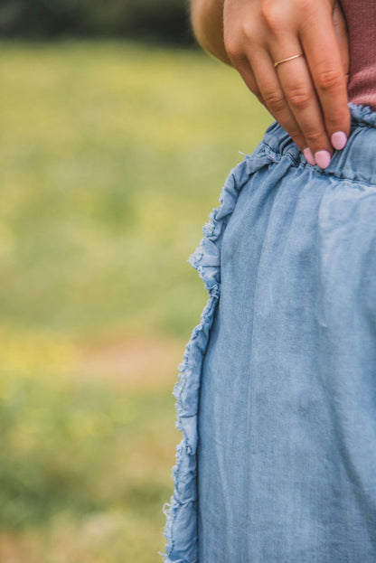 Myosotis light wash ruffled wide leg jeans with raw hem detail