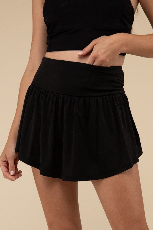 Wide band tennis skirt with pocket