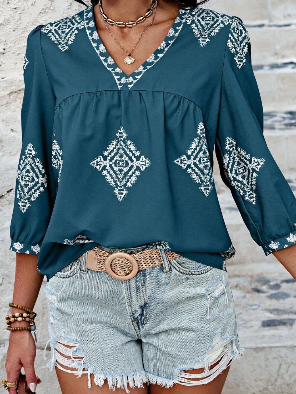 Printed V-Neck Three-Quarter Sleeve Blouse.