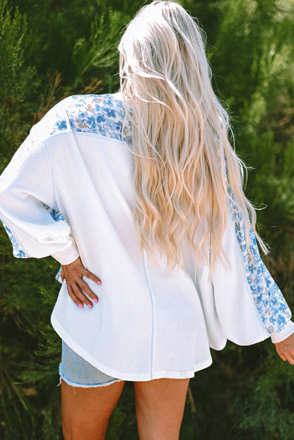 Chic white floral batwing blouse