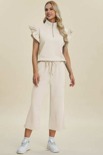 Double Take Full Size Texture Ruffle Short Sleeve Top and Wide Leg Pants Set.