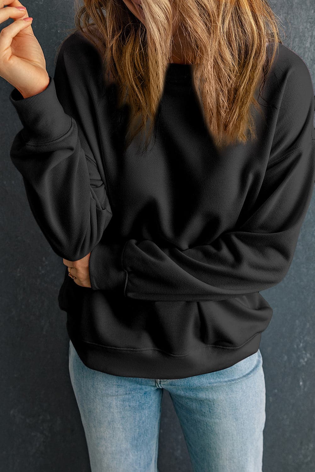 Round Neck Dropped Shoulder Sweatshirt.