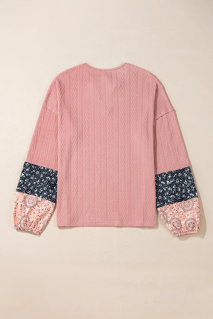 Dusty pink floral patchwork v-neck blouse with textured knit and drawstring detail