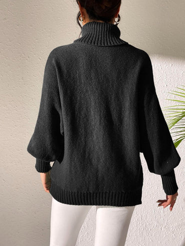 Charming heart-patterned turtleneck sweater with long sleeves