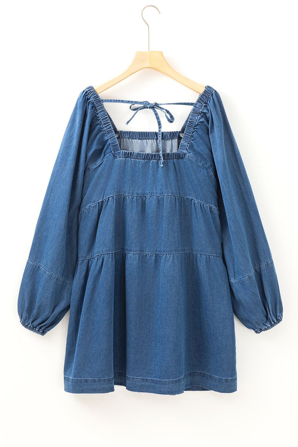 Dusk blue denim mini dress with square neckline and side pockets