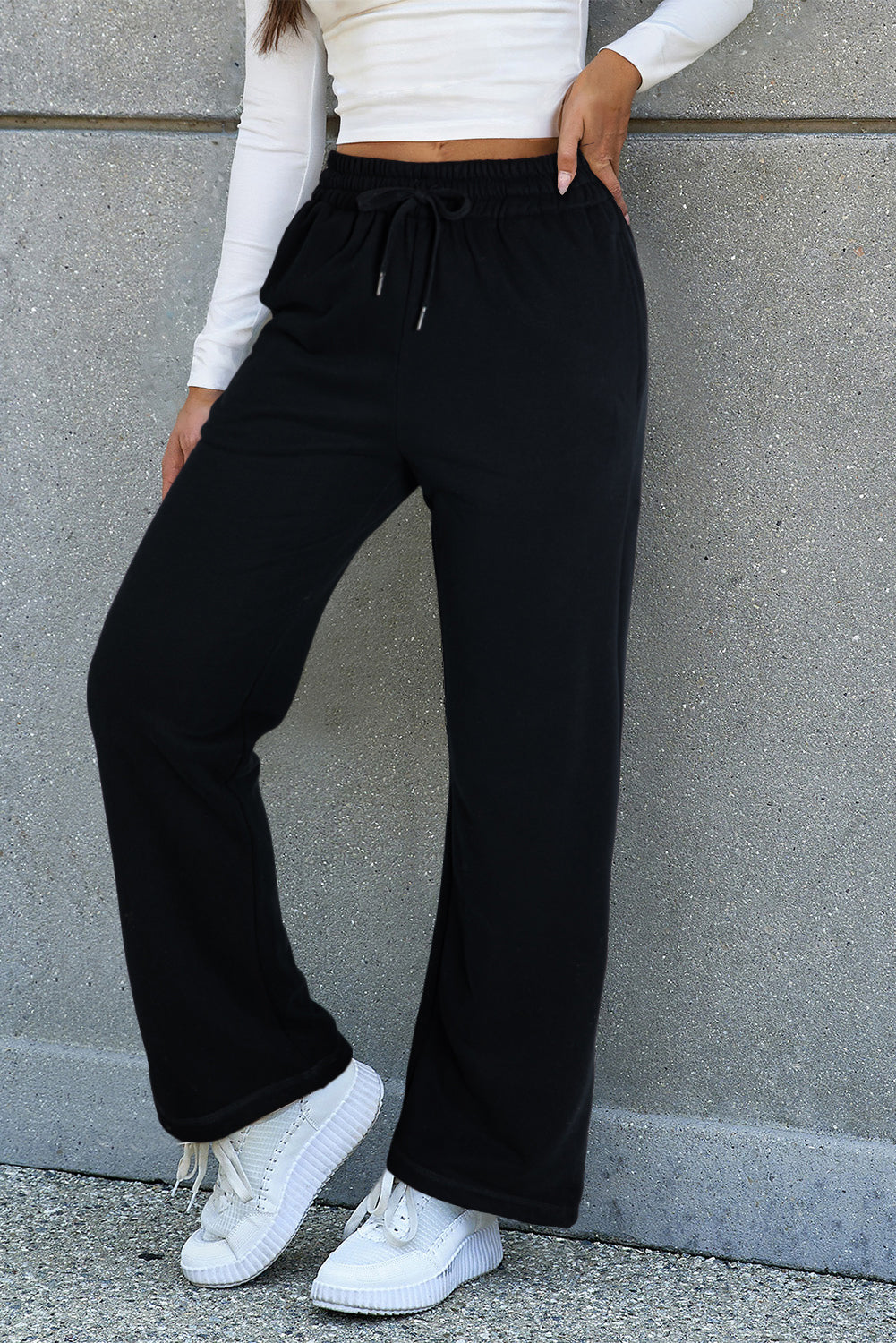 Cozy black fleece-lined casual pants with adjustable drawstring waist