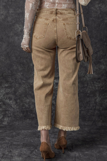 Chic light beige high-rise cropped wide-leg jeans with frayed hem