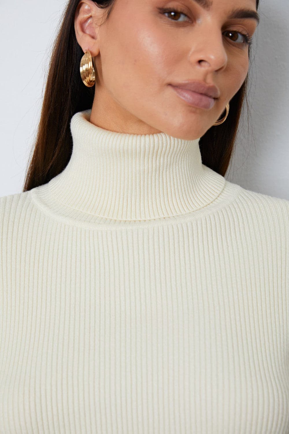 Turtleneck Dropped Shoulder Top and Pants Sweater Set.