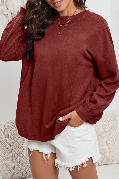 Twisted Round Neck Dropped Shoulder Sweatshirt.