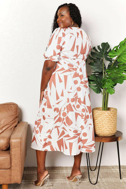 Printed Surplice Balloon Sleeve Dress.