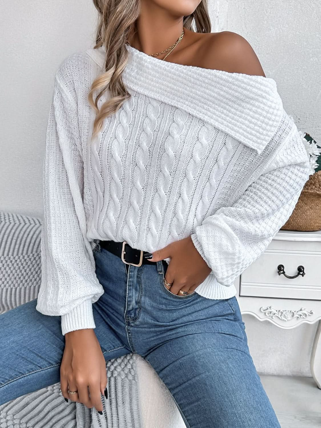 Asymmetrical cable-knit long sleeve sweater