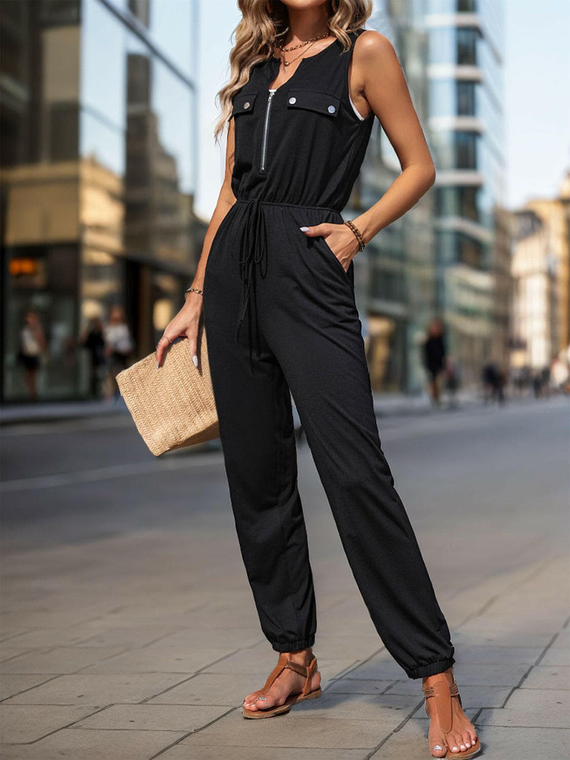 Half Zip Sleeveless Jumpsuit with Pockets.