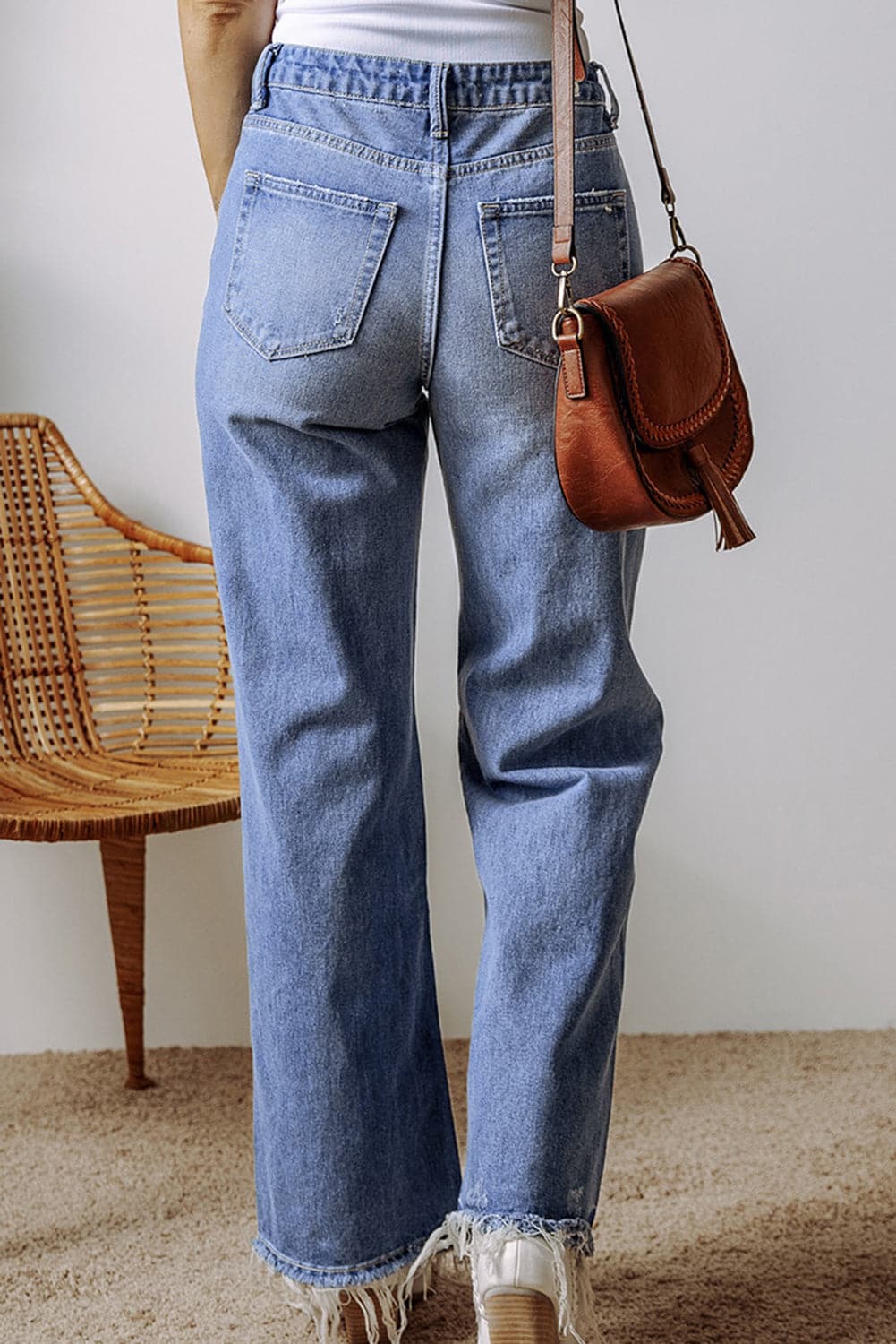 Distressed Straight Leg Jeans with Pockets.