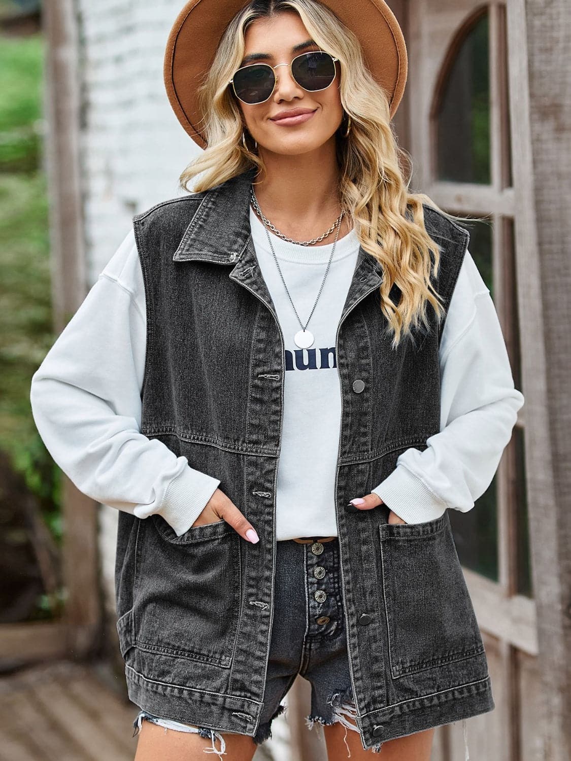 Button Front Sleeveless Denim Jacket.