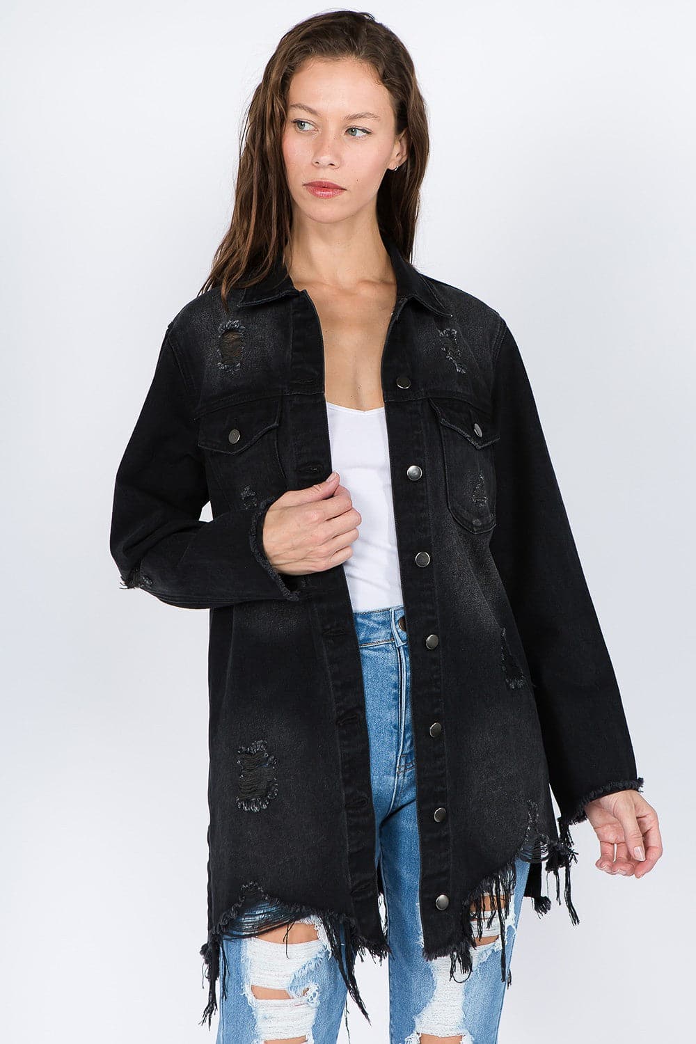 Vintage-inspired distressed denim jacket with frayed hem