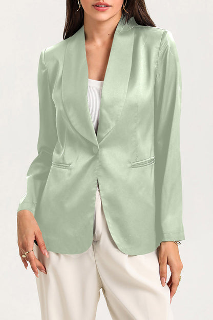 Elegant green blazer with collar and pockets for versatile style