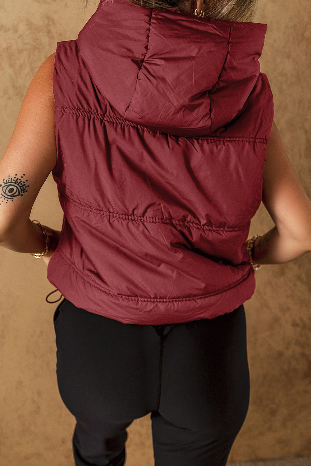 Clay hooded puffer vest with zip-up and side pockets