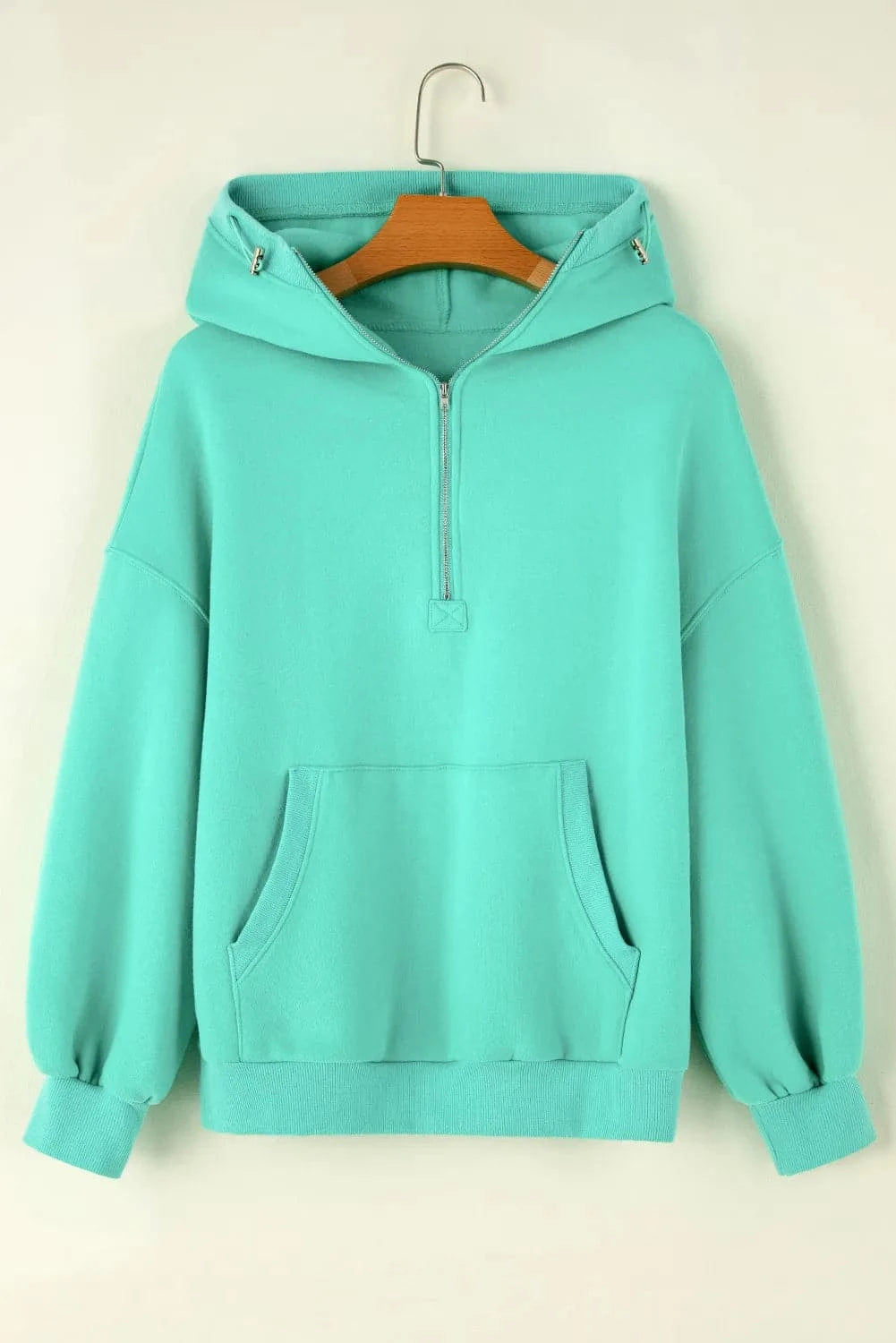 Versatile pocketed half zip hoodie for all-day comfort