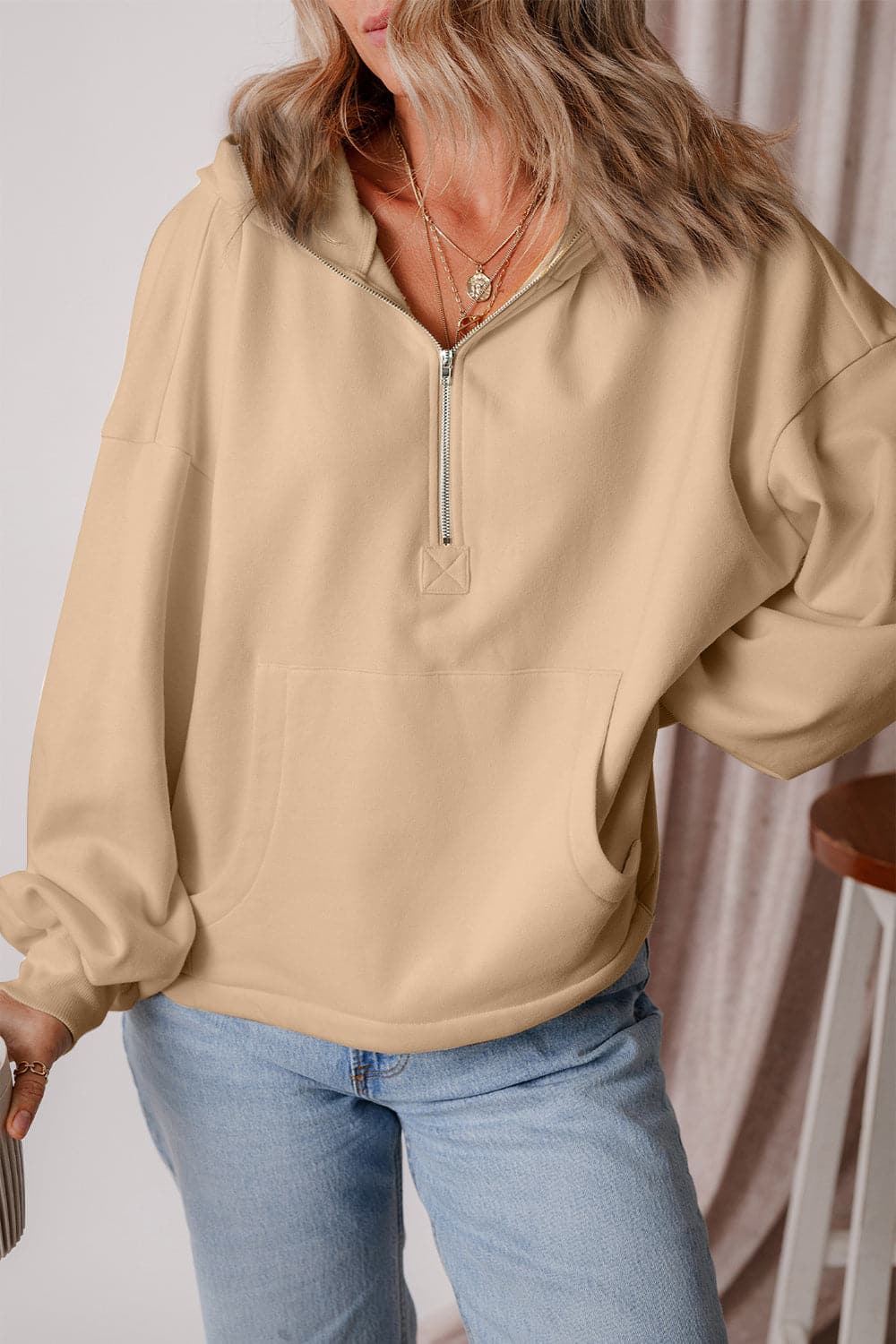 Pocketed Half Zip Dropped Shoulder Hoodie.