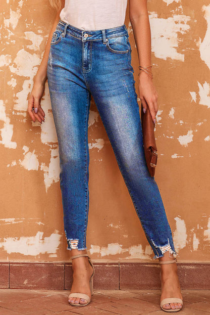 Chic blue ankle-length skinny jeans with raw hem detail