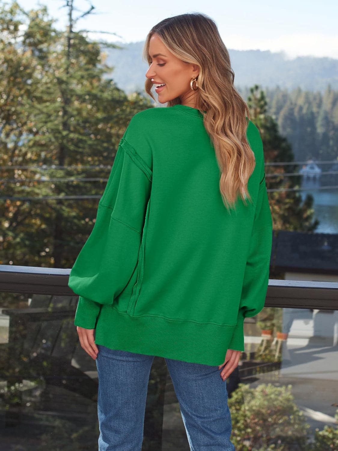 Slit Round Neck Long Sleeve Sweatshirt.