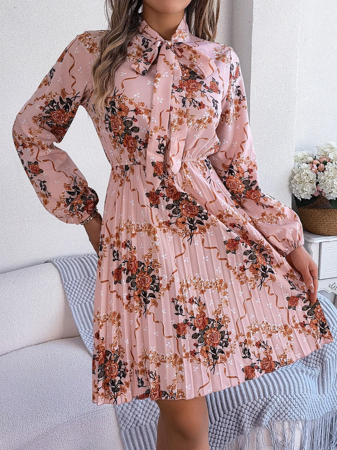 Pleated Printed Tie Neck Long Sleeve Dress.