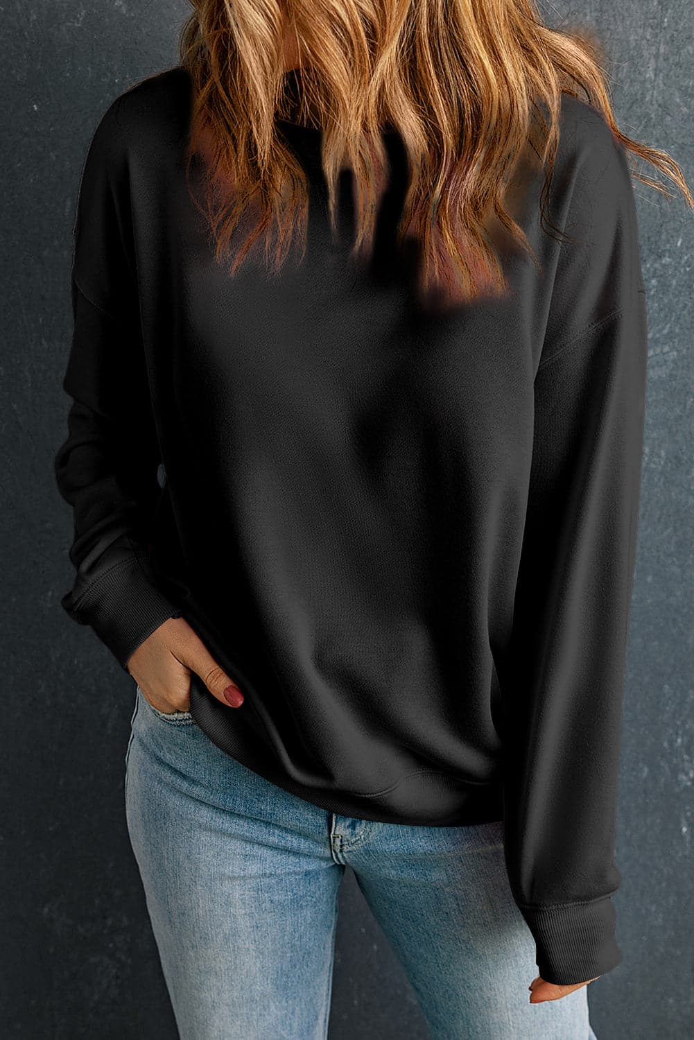 Round Neck Dropped Shoulder Sweatshirt.