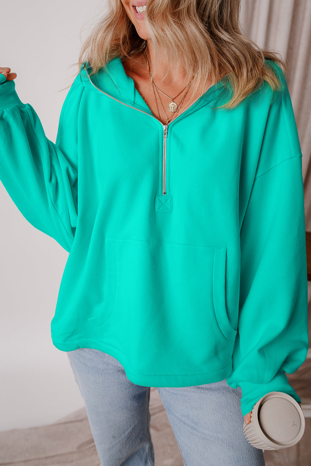 Cozy Aruba blue fleece hoodie with kangaroo pockets and half zipper design