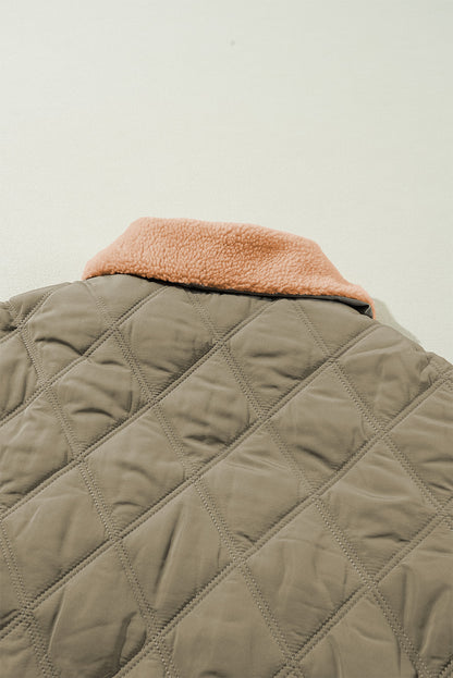 Cozy jungle green quilted puffer jacket with teddy collar and flap pockets