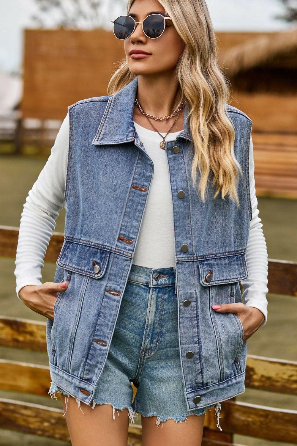 Sleeveless Collared Neck Denim Top with Pockets.