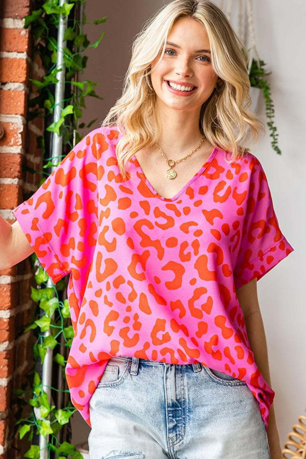 First Love Leopard V-Neck Short Sleeve Woven TopElevate Your Wardrobe with the First Love Leopard V-Neck Short Sleeve Woven Top
 The First Love Leopard V-Neck Short Sleeve Woven Top is the perfect fusion of bold sLove Salve -Neck Short Sleeve Woven Topusa