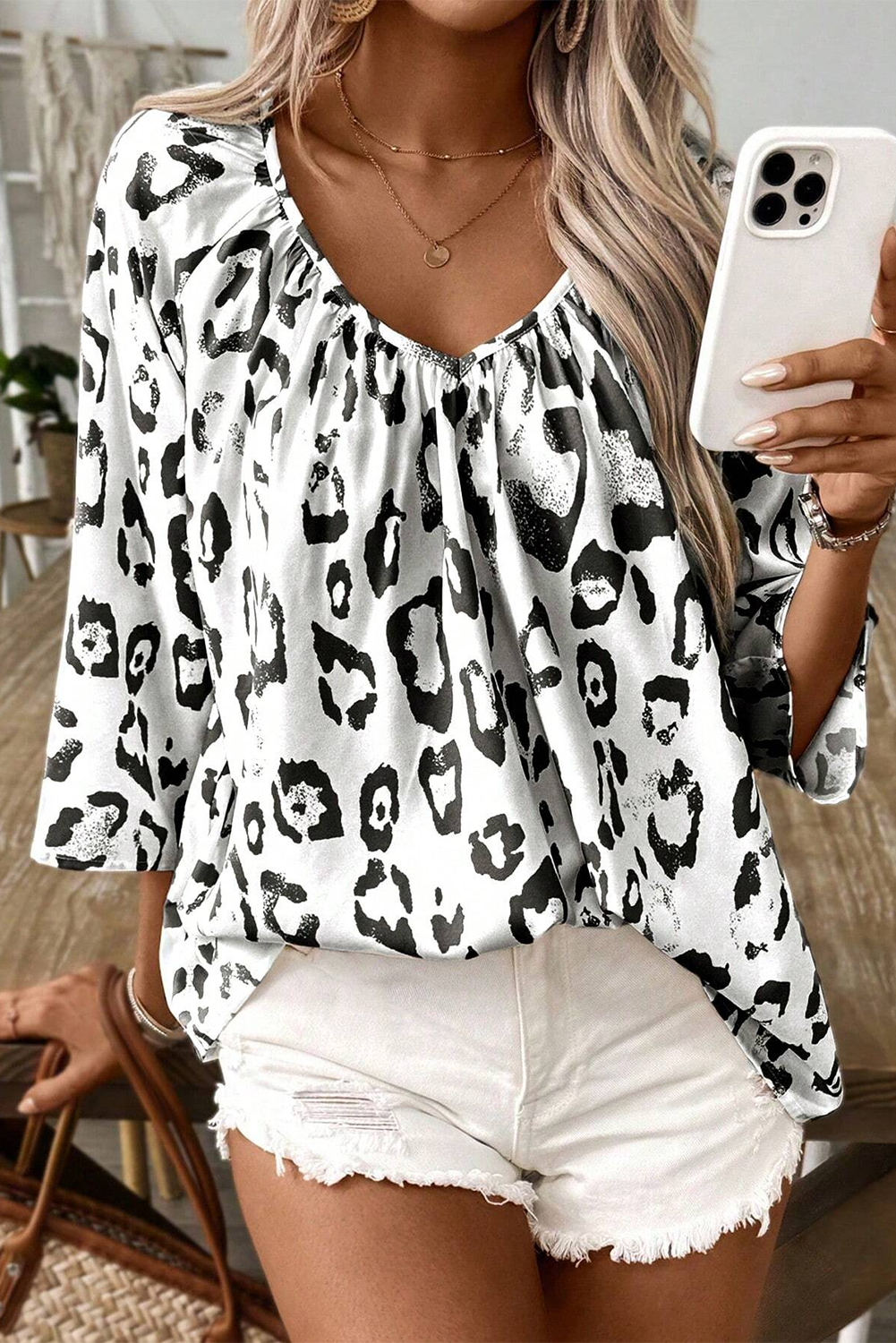 Fierce and Flirty Black Leopard Print Blouse with Ruched V-Neck