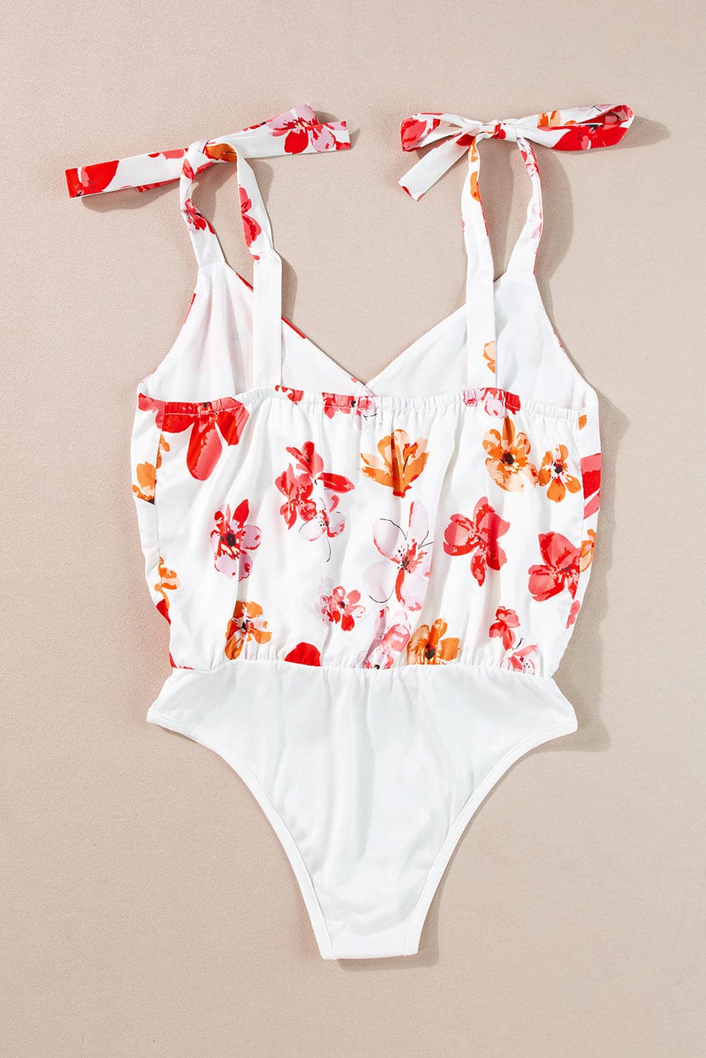 Tied Printed Surplice Sleeveless Bodysuit.