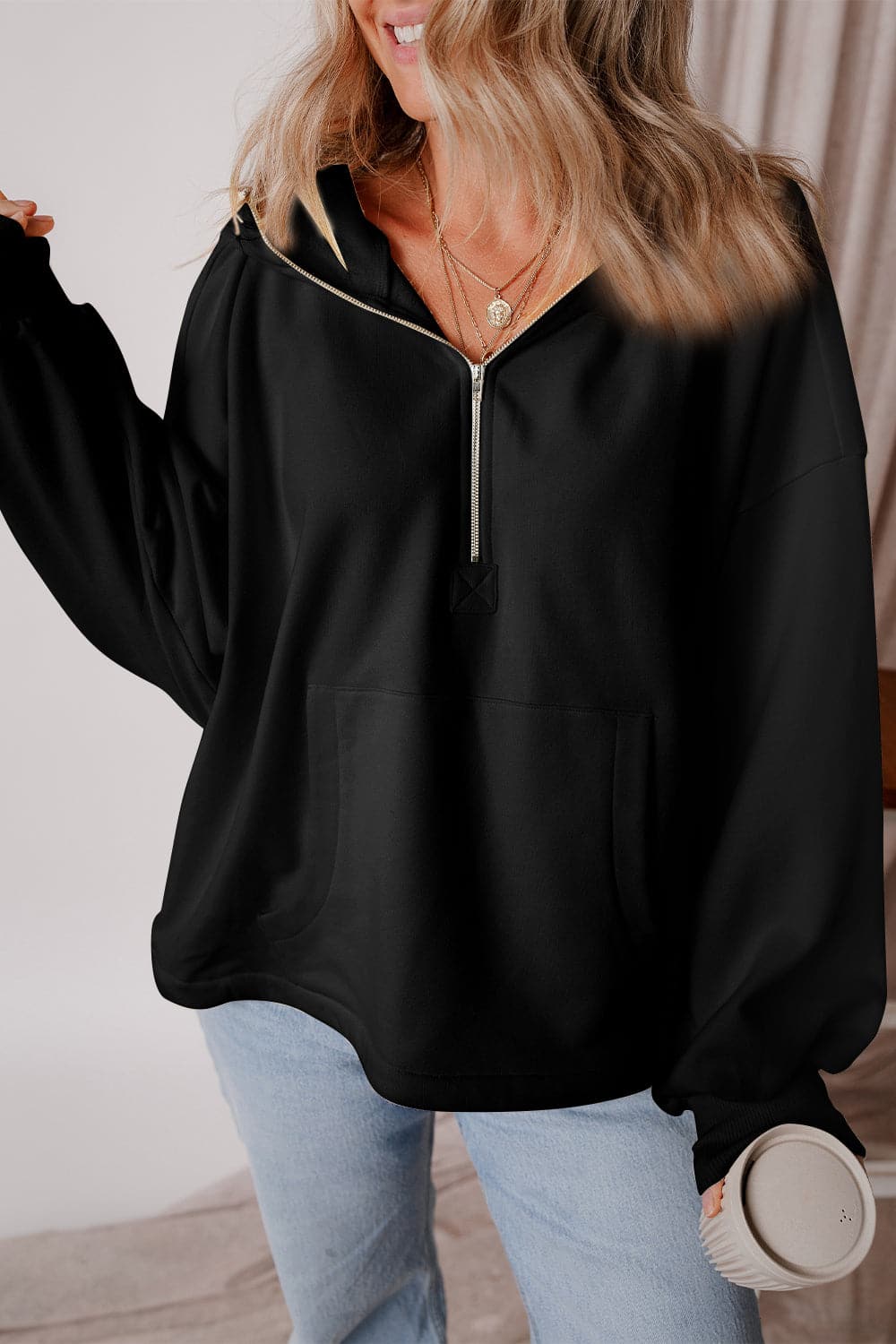 Casual pocketed half zip hoodie with dropped shoulders